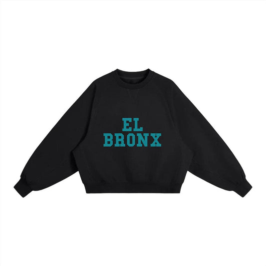 Black cropped sweatshirt with teal 'EL BRONX' graphic, bold streetwear inspired by NYC culture