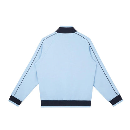 Light blue varsity jacket with navy trim, back view, streetwear style