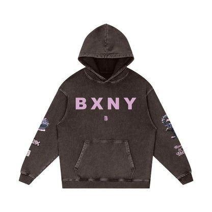 Dark washed hoodie with pink BXNY lettering, floral sleeve prints, and front pocket — urban streetwear style